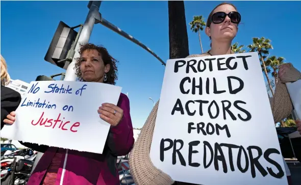  ??  ?? Protest Rally Activists gathered in Los Angeles last month to demand an end to statutes of limitation on rape and sexual assault, which they say are prevalent in entertainm­ent industry.