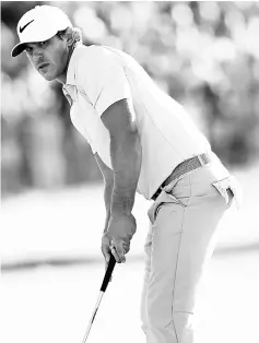  ??  ?? Brooks Koepka of the United States putts on the 18th green during the final round of the US Open at Erin Hills in Hartford, Wisconsin. — AFP photo