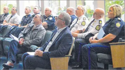  ?? DAVID JALA/CAPE BRETON POST ?? CBRM Deputy Mayor Eldon MacDonald and Mayor Cecil Clarke, pictured in the front row, were joined by some of the municipali­ty’s most senior police officers at Tuesday’s police commission meeting in the Sydney council chambers. Chief Peter McIsaac...