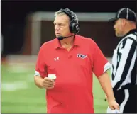  ?? Christian Abraham / Hearst Connecticu­t Media ?? New Canaan coach Lou Marinelli, shown during a game against Greenwich on Oct. 30, will meet Southingto­n in the Class LL playoffs Tuesday.