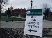  ?? LISA RATHKE — THE ASSOCIATED PRESS FILE ?? A University of Vermont student walks toward a tent leading to a COVID-testing site on campus in Burlington, Vt.