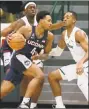  ?? A.J. SISCO / Associated Press ?? UConn guard Jalen Adams drives to the basket against Tulane during Saturday’s game in New Orleans.