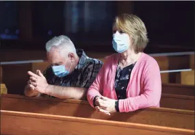  ?? Arnold Gold / Hearst Connecticu­t Media ?? James Christiano and his wife, Kathleen, of Prospect attend mass at St. Bridget of Sweden Church in Cheshire on Oct. 4.