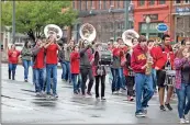  ??  ?? LEFT: The Rockmart High School band leads the parade.