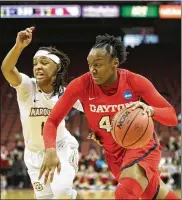  ?? DAVID JABLONSKI/STAFF ?? Dayton’s Jayla Scaife, dribbling last March, is among the players returning this season. Dayton will get 10 extra practices due to its overseas trip.