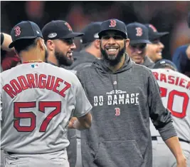  ?? CHRISTOPHE­R EVANS / BOSTON HERALD FILE ?? FIGHTING WORDS: Boston pitcher David Price sports a sweatshirt with the Red Sox’ slogan, ‘Do Damage,’ which has taken hold on social media during the team’s run to the World Series title. Fans took it to another level on Oct. 28, for Game 5, with 130,000 #DoDamage posts appearing on Twitter alone.