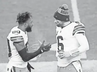  ?? CHARLES LECLAIRE/ USA TODAY SPORTS ?? Browns WR Jarvis Landry celebrates with QB Baker Mayfield during Sunday’s game in Pittsburgh.