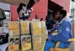  ?? ?? SIMCARD sellers for MTN Group mobile network wait for customers at a roadside kiosk in Lagos, Nigeria. | BLOOMBERG