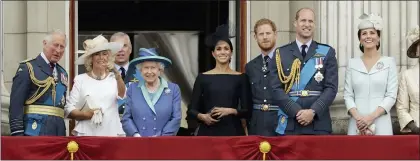  ?? MATT DUNHAM — THE ASSOCIATED PRESS FILE ?? Members of the royal family gather in 2018 on the balcony of Buckingham Palace, with from left, Britain’s Prince Charles, Camilla the Duchess of Cornwall, Prince Andrew, Queen Elizabeth II, Meghan the Duchess of Sussex, Prince Harry, Prince William and Kate the Duchess of Cambridge.