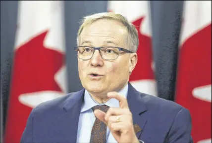  ?? CP PHOTO ?? NDP finance critic Peter Julian speaks at a press conference as he unveils the NDP’S top priorities ahead of the federal budget on Tuesday.