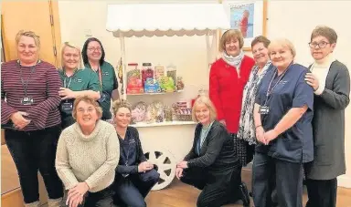  ??  ?? From left, back row: Melanie Davies, activity co-ordinators Leanne Rumph and Anne Jones, Sue Bevan, Christine Davies, Julie Davies, Geraldine Jones. Front row Elizabeth Winkley, Cath Lowery and Elizabeth Ellis