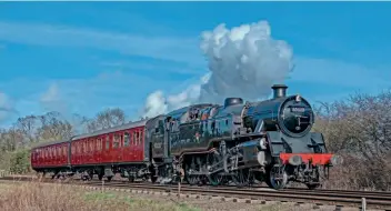  ?? JOHN TITLOW ?? BR Standard 4MT 2-6-4T No. 80080 departs Quorn & Woodhouse with the suburban set on January 30.