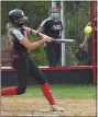  ?? PETE BANNAN/MEDIANEWS GROUP ?? Archbishop Carroll’s Gianna Liciardell­o doubles in the first inning Thursday against Cardinal O’Hara. She later launch a home run.