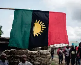  ??  ?? Supporters of the Indigenous People of Biafra (IPOB) hold a march through the Osusu district in Aba on Sunday. (AFP)