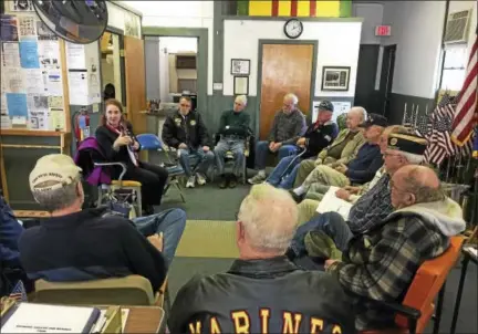  ?? BEN LAMBERT — THE REGISTER CITIZEN ?? Rep. Elizabeth Esty met with local veterans for a roundtable discussion Monday in Torrington. Esty asked those who attended her gathering to discuss their experience with services for veterans, care, benefits, regulation­s and other areas of concern.