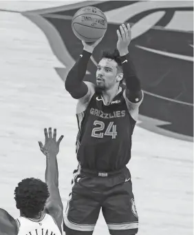  ?? NELSON CHENAULT/USA TODAY SPORTS ?? Memphis Grizzlies forward Dylan Brooks shoots during the third quarter against the Chicago Bulls at Fedexforum.