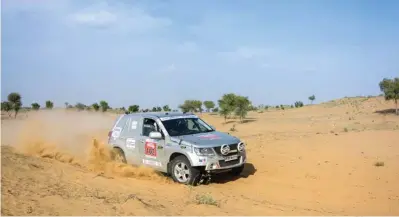  ??  ?? Below: Team Maruti’s Suresh Rana and Ashwin Naik won the event in their Maruti Suzuki Grand Vitara