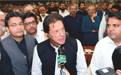  ?? AP ?? Imran Khan speaks at the National Assembly in Islamabad yesterday after being elected as prime minister. Lawmakers elected former cricket star as the premier in a step towards third straight transfer of power from one civilian government to another one.