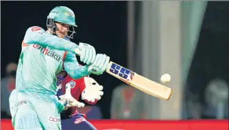  ?? BCCI ?? LSG’s Quinton De Kock on way to a match-winning 80 off 52 balls against Delhi Capitals at the DY Patil Stadium on Thursday.