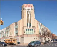  ?? BEBETO MATTHEWS, AP ?? Traffic passes a Sears store in Brooklyn’s Flatbush neighborho­od on March 22. The company announced March 9 that it lost $607 million in the fourth quarter.