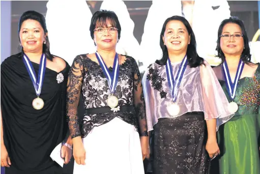  ??  ?? From left: Teachers Mary Jane Ramo of Tonggo Elementary School, Alma Janagap of Pavia National High School, Aimee Marie Gragasin of Philippine Science High School- Cagayan Valley Campus and Carla Dimalanta of the University of the Philippine­s Diliman are presented during the awarding ceremony of the 2018 Metrobank Foundation Outstandin­g Filipinos on September 7 at the Metrobank Plaza Auditorium in Makati City.