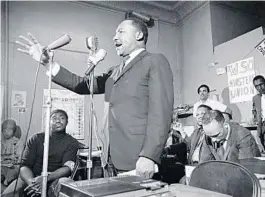  ?? JEFF KAMEN/MICHAEL OCHS ARCHIVES-GETTY ?? American civil rights activist Martin Luther King Jr. (1929 - 1968) addresses a meeting in Chicago, Illinois, on May 27, 1966.