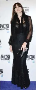  ??  ?? Actress Monica Bellucci poses for photograph­ers upon arrival for the premiere of the film ‘On The Milk Road’.