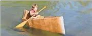  ?? Blake Doss / Rome News-Tribune ?? Logan Faslun, 7, paddles on Rolater Lake in the S.S. Shipwreck.