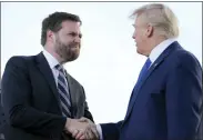  ?? JOE MAIORANA/ASSOCIATED PRESS ?? Senate candidate JD Vance, left, greets former President Donald Trump at a rally at the Delaware County Fairground­s, Saturday, April 23, 2022, in Delaware, Ohio, to endorse Republican candidates ahead of the Ohio primary on May 3. On Tuesday voters in Ohio choose between the Trump-backed JD Vance for an open U.S. Senate seat and several other contenders who spent months clamoring for the former president’s support.