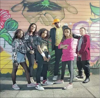  ?? Nino Fernandez ?? M AYA Fleming, 11, from left; Tommy Shepherd III, 12; Lillian Ellis, 11; and Kali de Jesus, 11; are part of the Grammy-nominated Alphabet Rockers, formed by adults Kaitlin McGaw and Tommy Soulati Shepherd.