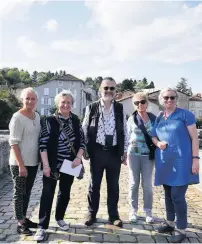  ??  ?? Auld alliance Jacqui Hellegouar­c, second from right, standing between Tom McEwan and Sandra Cairncross from Pitlochry on their visit to their twin-town of Confolens in France