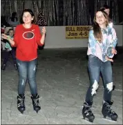  ??  ?? RIGHT: Johnson Elementary fifth-graders Liliana Owens (left) and Abbi Worthingto­n skate along to the song “Ghostbuste­rs,” a regular played at the Forum River Center ice rink. Every time the song says the word ghost, skaters are supposed to switch directions.