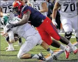  ?? MICHAEL HICKEY / GETTY IMAGES ?? Chunky Clements, a former TrotwoodMa­dison High standout, played defensive end and tackle as a four-year player for the Illinois Fighting Illini.