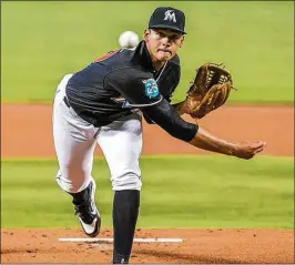  ?? MIAMI HERALD ?? Pablo Lopez went six innings in his major league debut Saturday, allowing two runs on six hits with five strikeouts in the Marlins’ 5-2 win over the Mets.