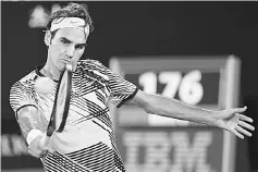  ??  ?? Switzerlan­d’s Roger Federer hits a return against Spain’s Rafael Nadal during the men’s singles final on day 14 of the Australian Open tennis tournament in Melbourne on Jan 29 file photo. — AFP photo