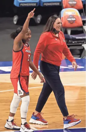  ?? TROY TAORMINA/USA TODAY SPORTS ?? Arizona guard Aari Mcdonald (2) and coach Adia Barnes stunned Uconn to reach the national title game.