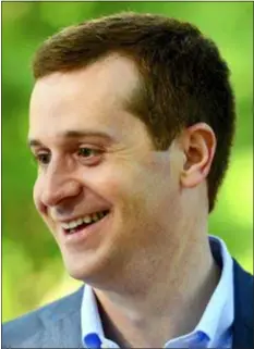  ?? JEFF SINER — THE CHARLOTTE OBSERVER VIA AP ?? In this file photo Ninth Congressio­nal district Democratic candidate Dan McCready smiles as he speaks with U.S. Rep. Alma Adams outside Eastover Elementary School in Charlotte, N.C.