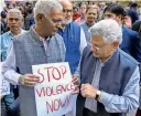  ?? PTI ?? D Raja, general secretary of the CPI, and Sitaram Yechury, general secretary of the CPM, take part in a peaceful protest in New Delhi on Wednesday. —