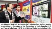  ??  ?? I&B Minister Venkaiah Naidu with MOS Rajyavardh­an Rathore visiting an exhibition at the release of the Government of India Calendar-2017 and Press in India Report 2015-16 at National Media Centre in New Delhi