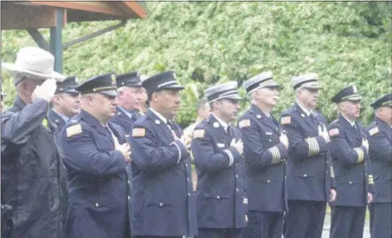  ?? JOSEPH PHELAN — JPHELAN@DIGITALFIR­STMEDIA.COM ?? Members of Saratoga Springs police and fire department­s attend the ceremony Tuesday.