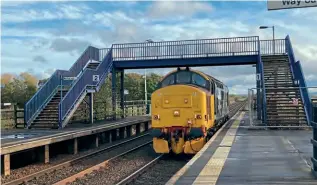  ?? REX CARVER ?? Teesside Airport station has long suffered low usage as it is a long walk in the open to the terminal building, but no trains have called since May 2022 as the platforms were deemed unsafe. On October 28, No. 37403 passes through light engine heading towards Darlington.