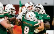  ?? ALLEN EYESTONE / THE PALM BEACH POST ?? Braxton Berrios (362 yards and fifive touchdowns) has helped the Miami receiving corps survive an injury to Ahmmon Richards.