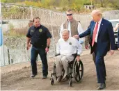  ?? ERIC GAY/AP ?? Former President Donald Trump talks with Texas Gov. Greg Abbott at Shelby Park on a trip Thursday to the southern border in Eagle Pass, Texas, 300 miles from Biden.