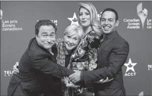  ?? CP PHOTO ?? Shaun Majumder will not be returning to the CBC-TV satirical news program “This Hour Has 22 Minutes.” Mark Critch, left to right, Cathy Jones, Susan Kent and Shaun Majumder arrive on the red carpet at the 2015 Canadian Screen Awards in Toronto on Sunday, March 1, 2015.