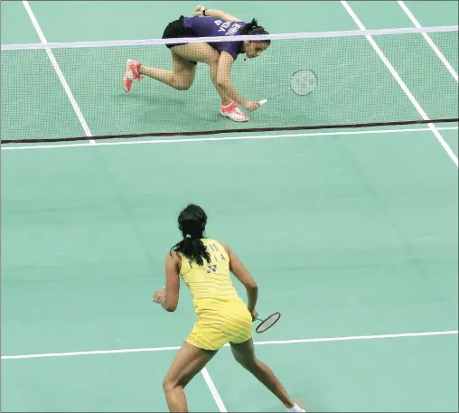  ?? Praveen Khanna ?? Apart from brief passages of play in the first game, Sindhu was comfortabl­e in quashing Saina’s challenge.