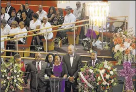  ?? Erik Verduzco Las Vegas Review-Journal ?? Assemblywo­man Daniele Monroe-Moreno, center, speaks on behalf of legislativ­e friends and colleagues of Assemblyma­n Tyrone Thompson, who died May 4 at age 51, during his funeral service Saturday at Victory Missionary Baptist Church.