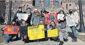  ?? SUBMITTED PHOTO ?? Peterborou­gh high school students, front from left, Maddy Cockburn-Adams, Larissa Kali, Emma Booth and Rachelle Peters, and, back from left, Jacob Bowman, Rachel Stone, Ava Lyall, Prasanna Salagala, Joy Stalteri-Roberts, Vimbainash­e Magumbe, Hannah Grills, protest inaction on climate change outside Queen’s Park in Toronto on Friday.