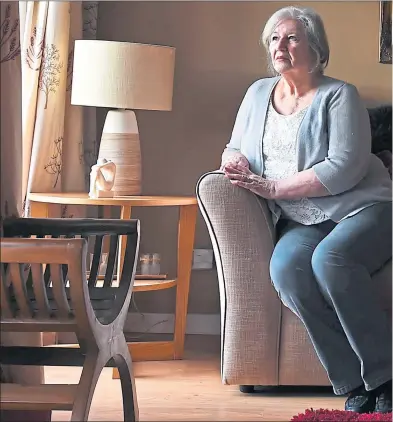  ??  ?? Margaret Caldwell waits for news at home in Erskine, 15 years after the violent death of her daughter, Emma, 27, pictured below when a young girl