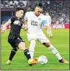  ?? ?? PAOK’s Eleftherio­s Lyratzis (left), tries to stop Marseille’s Dimitri Payet during the Europa Conference League quarter-final soccer match between Olympique Marseille and PAOK FC at the Velodrome stadium in Marseille, southern France, on April 7. (AP)
