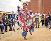  ??  ?? Members of the Oklahoma Fancy Dancers : Native Dance Troupe perform during the Indigenous Peoples Day ceremony on the campus of Oklahoma City University.